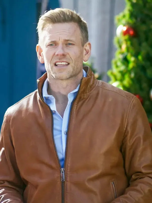 A Christmas Less Traveled 2024 Eric Johnson Brown Leather Jacket