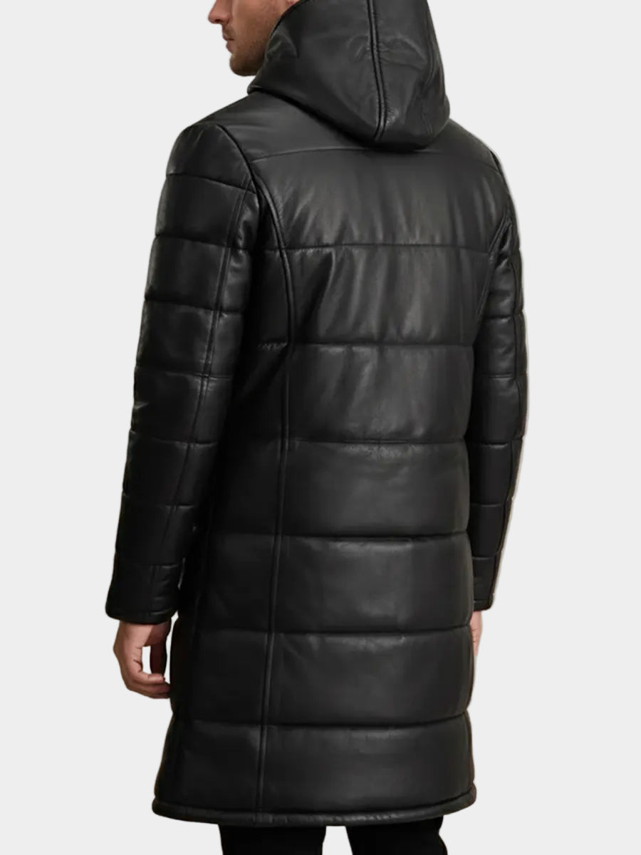 Man wearing a black puffer coat with a hood
