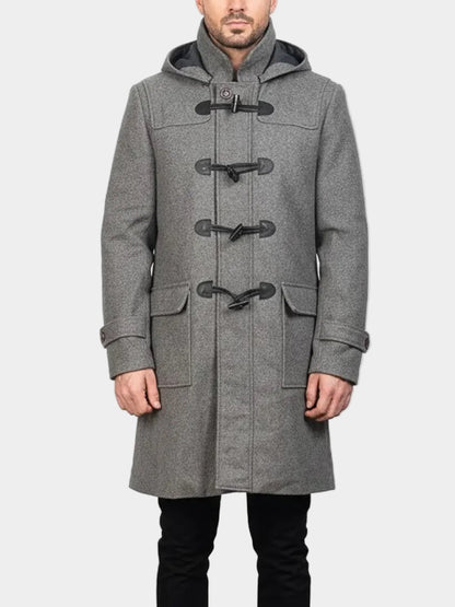 Man wearing a gray duffle coat with black buttons on a white background