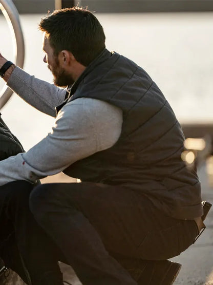 Scott Eastwood Alarum 2025 Joe Travers Black Vest